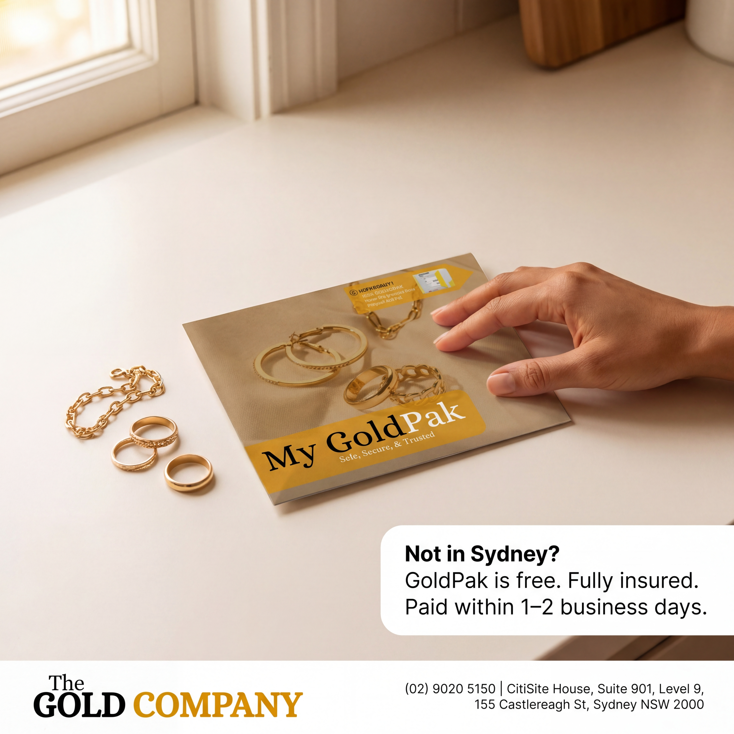 GoldPak envelope with gold jewellery on kitchen table — mail in gold Australia